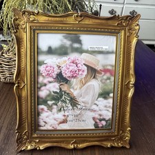 Cornice portafoto in bronzo